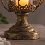 Candelabro hojas dorado