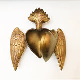 Corazón dorado alado