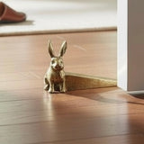 Sujetapuerta conejo dorado