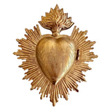 Corazón relicario dorado
