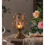 Candelabro hojas dorado