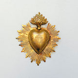 Corazón relicario dorado