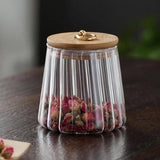 Contenedor vidrio asa dorada